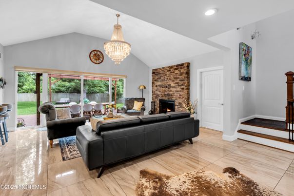 Chandelier, Dining room, Fireplace, Interior, Living room, Recessed Lighting, Stone Walls