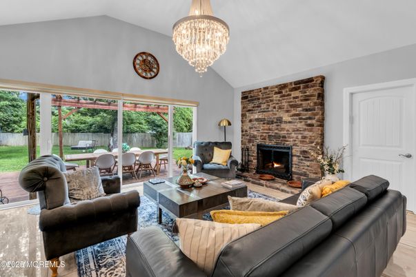 Chandelier, Fireplace, Interior, Living room, Stone Walls