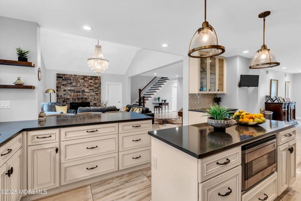 Chandelier, Interior, Kitchen, Pendant Lights, Recessed Lighting, Stone Walls, Wood Texture Flooring