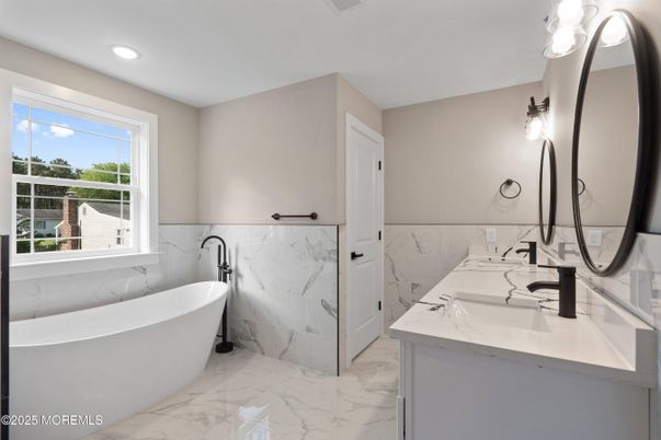 Bathroom, Dual Sink Vanities, Free Standing Baths, Interior, Marble, Marble Walls, Recessed Lighting
