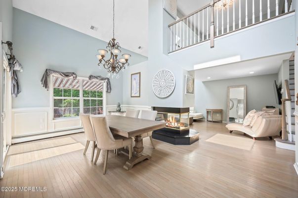 Chandelier, Dining room, Fireplace, Interior, Recessed Lighting, Wood Texture Flooring
