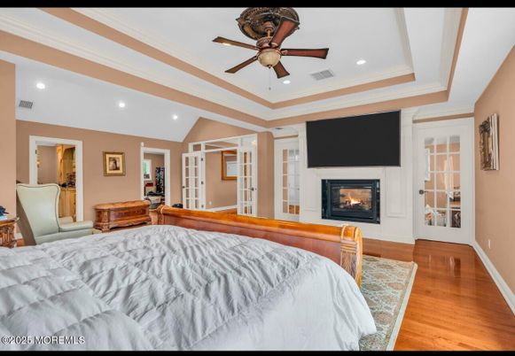Bedroom, Fireplace, Interior, Recessed Lighting, Wood Texture Flooring