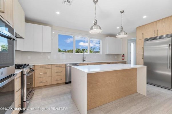 Interior, Kitchen, Pendant Lights, Recessed Lighting, Stainless Steel Appliances, Water, Wood Texture Flooring