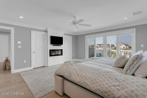 Bedroom, Fireplace, Interior, Recessed Lighting, Wood Texture Flooring
