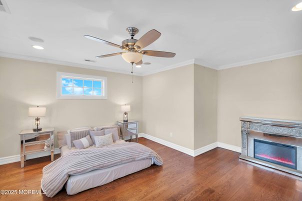 Bedroom, Fireplace, Interior, Recessed Lighting, Wood Texture Flooring