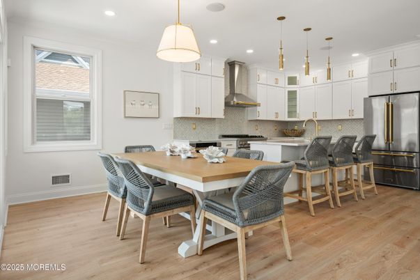 Dining room, Interior, Kitchen, Pendant Lights, Recessed Lighting, Stainless Steel Appliances, Wood Texture Flooring