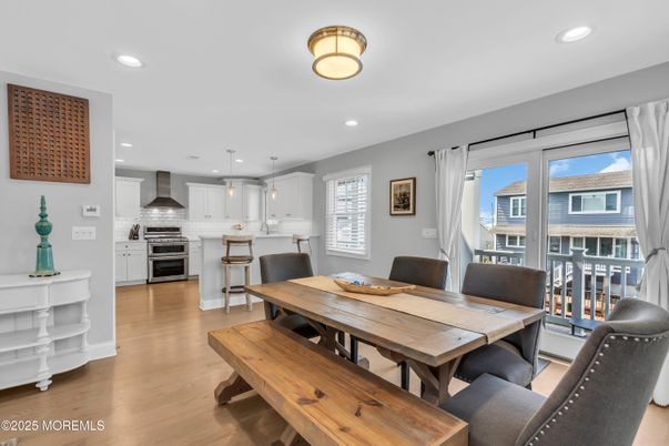 Dining room, Interior, Kitchen, Pendant Lights, Recessed Lighting, Stainless Steel Appliances, Wood Texture Flooring