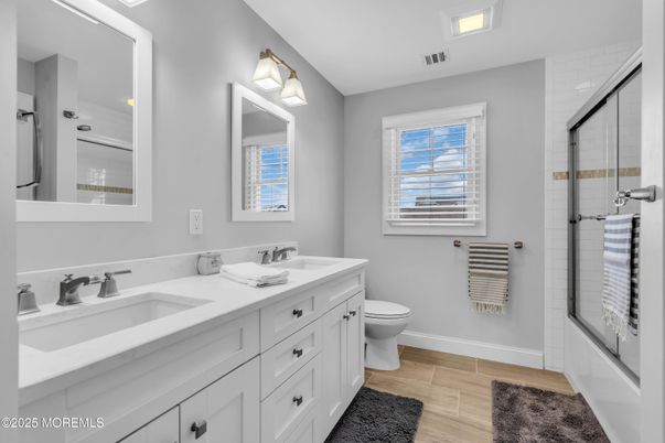 Bathroom, Dual Sink Vanities, Glass Shower, Interior, Wood Texture Flooring
