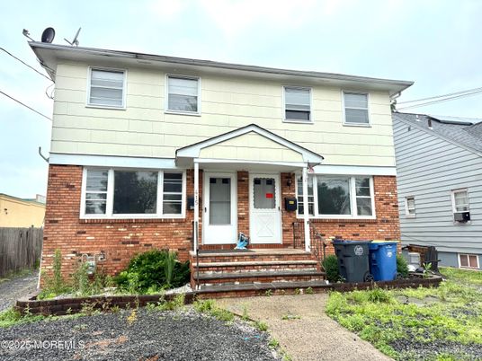 Exterior, Facade, Brick Facade, American Foursquare