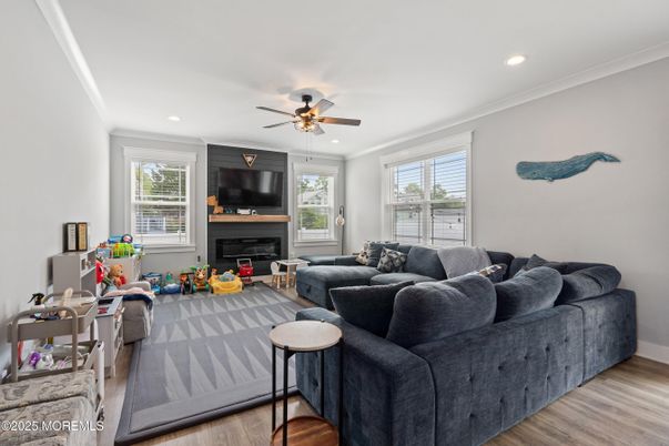 Fireplace, Interior, Living room, Recessed Lighting, Wood Texture Flooring