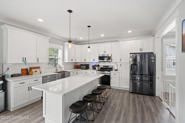 Interior, Kitchen, Pendant Lights, Recessed Lighting, Stainless Steel Appliances, Wood Texture Flooring