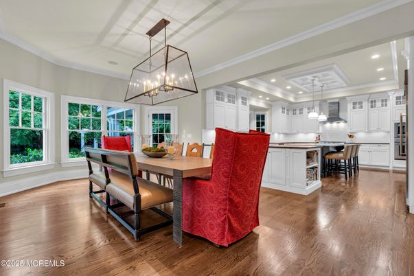 Chandelier, Dining room, Interior, Kitchen, Pendant Lights, Recessed Lighting, Stainless Steel Appliances, Wood Texture Flooring