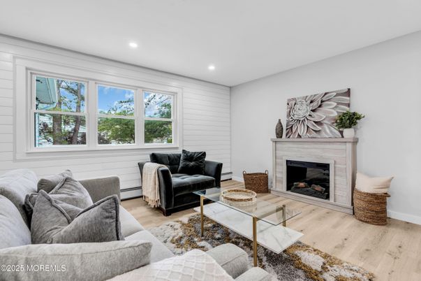 Fireplace, Interior, Living room, Recessed Lighting, Wood Texture Flooring