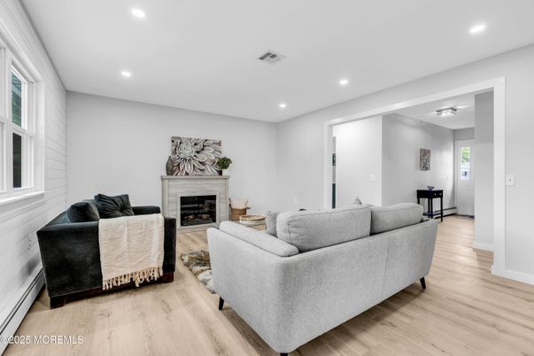 Fireplace, Interior, Living room, Recessed Lighting, Wood Texture Flooring
