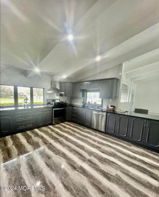 Interior, Kitchen, Marble Walls, Stainless Steel Appliances
