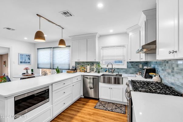 Interior, Kitchen, Pendant Lights, Recessed Lighting, Stainless Steel Appliances, Wood Texture Flooring