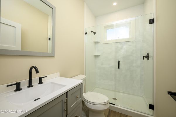 Bathroom, Glass Shower, Interior, Recessed Lighting, Wood Texture Flooring