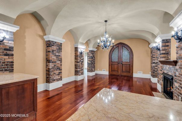 Chandelier, Fireplace, Interior, Stone Walls, Wood Texture Flooring