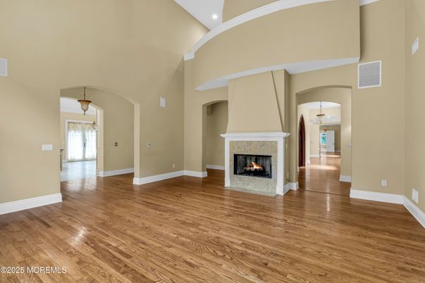 Empty room, Fireplace, Interior, Pendant Lights, Recessed Lighting, Wood Texture Flooring