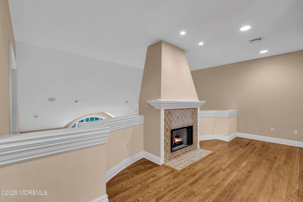 Fireplace, Interior, Recessed Lighting, Wood Texture Flooring
