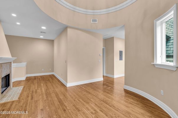 Empty room, Fireplace, Interior, Recessed Lighting, Wood Texture Flooring