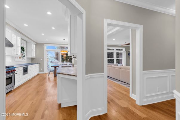 Dining room, Interior, Kitchen, Pendant Lights, Recessed Lighting, Stainless Steel Appliances, Wood Texture Flooring