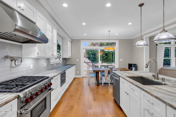 Dining room, Interior, Kitchen, Pendant Lights, Recessed Lighting, Stainless Steel Appliances, Wood Texture Flooring