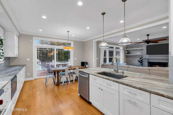 Dining room, Fireplace, Interior, Kitchen, Living room, Pendant Lights, Recessed Lighting, Wood Texture Flooring