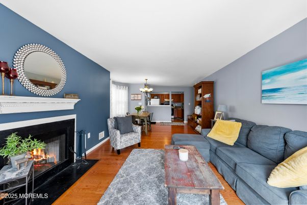 Chandelier, Dining room, Fireplace, Interior, Living room, Wood Texture Flooring