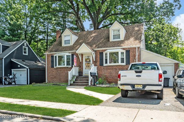 Exterior, Facade, Brick Facade, Cape Cod