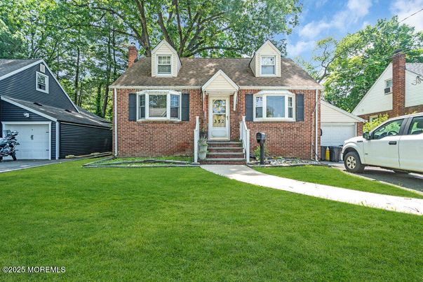 Attached, Exterior, Facade, Brick Facade, Cape Cod