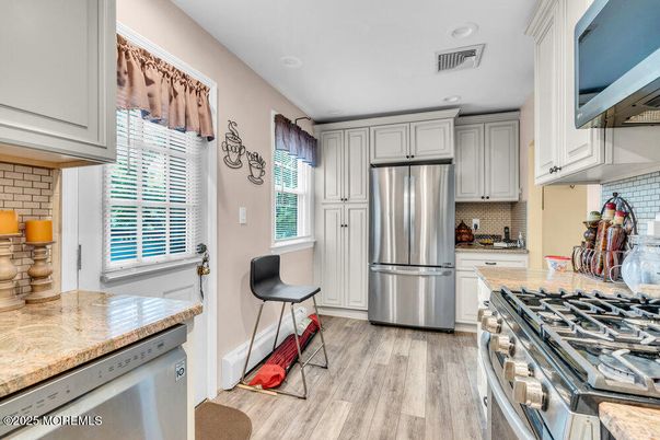 Interior, Kitchen, Recessed Lighting, Stainless Steel Appliances, Wood Texture Flooring