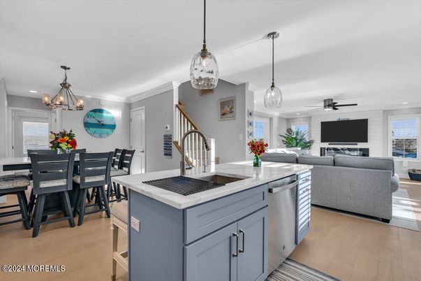 Dining room, Interior, Kitchen, Living room, Pendant Lights, Recessed Lighting, Stainless Steel Appliances, Wood Texture Flooring