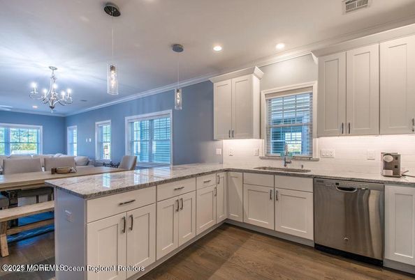 Chandelier, Interior, Kitchen, Pendant Lights, Recessed Lighting, Stainless Steel Appliances, Wood Texture Flooring