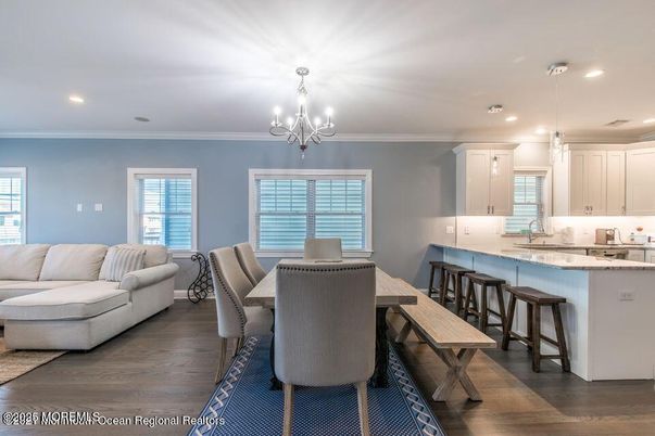 Chandelier, Dining room, Interior, Kitchen, Living room, Pendant Lights, Recessed Lighting, Wood Texture Flooring