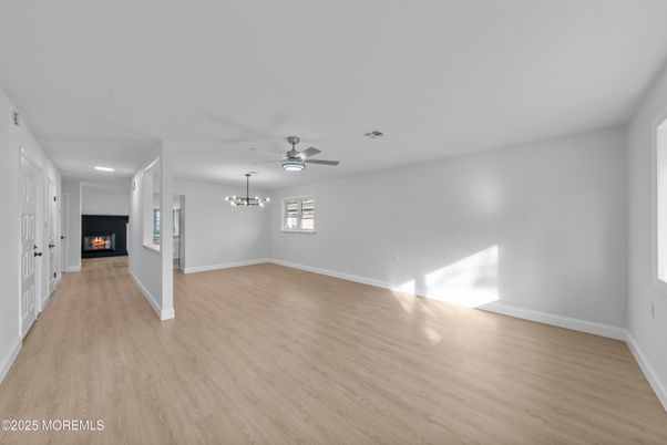 Empty room, Fireplace, Interior, Recessed Lighting, Wood Texture Flooring