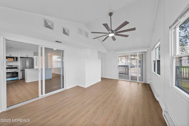 Empty room, Interior, Kitchen, Stainless Steel Appliances, Wood Texture Flooring