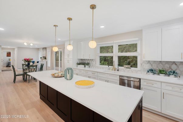 Dining room, Interior, Kitchen, Pendant Lights, Recessed Lighting, Stainless Steel Appliances, Wood Texture Flooring