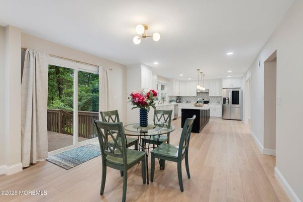 Dining room, Interior, Kitchen, Pendant Lights, Recessed Lighting, Stainless Steel Appliances, Wood Texture Flooring
