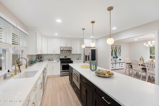 Dining room, Interior, Kitchen, Pendant Lights, Recessed Lighting, Stainless Steel Appliances, Wood Texture Flooring