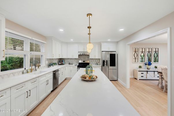Interior, Kitchen, Pendant Lights, Recessed Lighting, Stainless Steel Appliances, Wood Texture Flooring