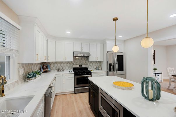 Interior, Kitchen, Pendant Lights, Recessed Lighting, Stainless Steel Appliances, Wood Texture Flooring