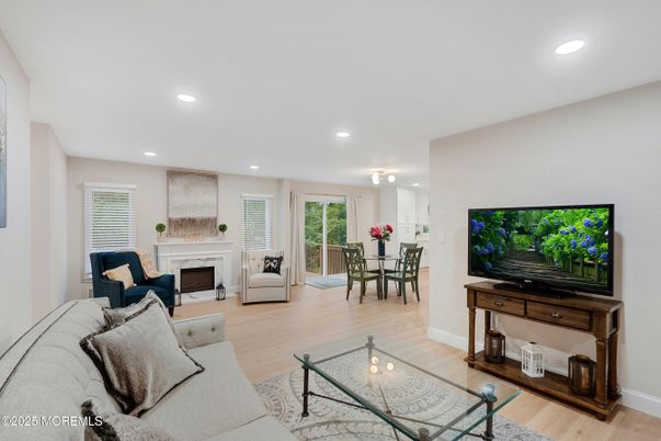 Dining room, Fireplace, Interior, Living room, Recessed Lighting, Wood Texture Flooring
