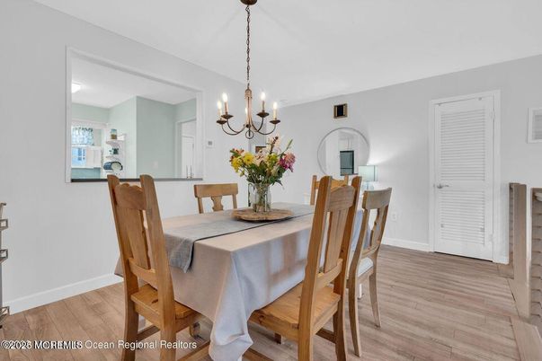 Chandelier, Dining room, Interior, Wood Texture Flooring