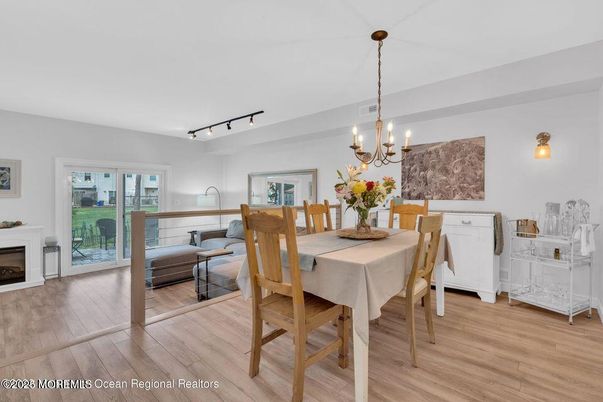 Chandelier, Dining room, Fireplace, Interior, Wood Texture Flooring