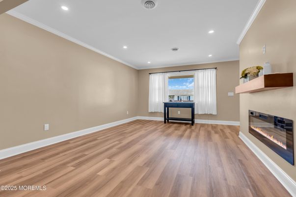 Empty room, Fireplace, Interior, Recessed Lighting, Wood Texture Flooring