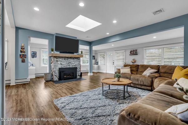 Fireplace, Interior, Living room, Recessed Lighting, Wood Texture Flooring