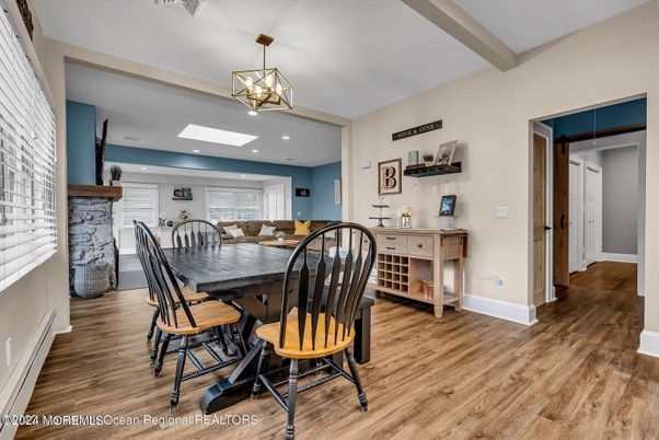 Dining room, Fireplace, Interior, Pendant Lights, Recessed Lighting, Wood Texture Flooring