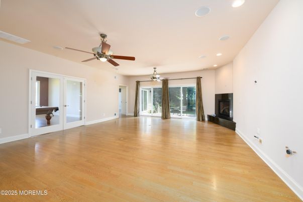 Empty room, Fireplace, Interior, Recessed Lighting, Wood Texture Flooring
