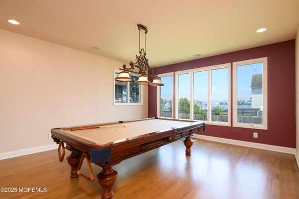 Billiard Table, Chandelier, Game Room, Interior, Recessed Lighting, Wood Texture Flooring
